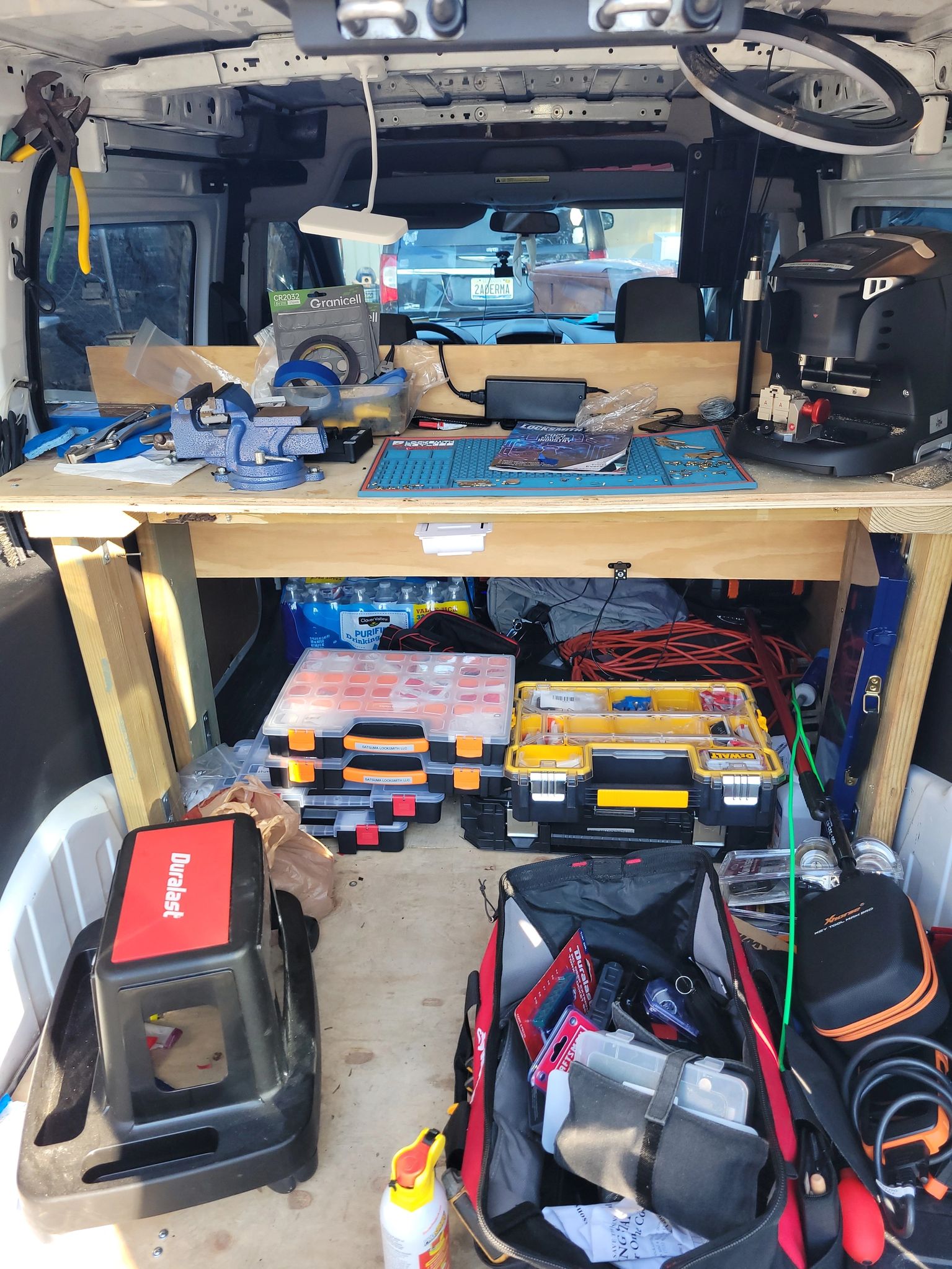 Inside the Satsuma Locksmith service van — the mobile workbench and key-programming tools